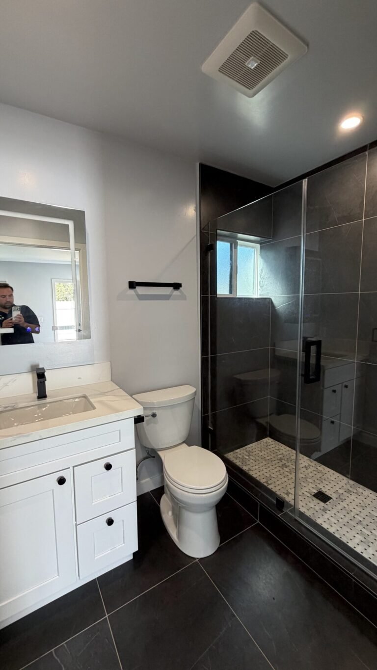 Glass shower with matte black fixtures