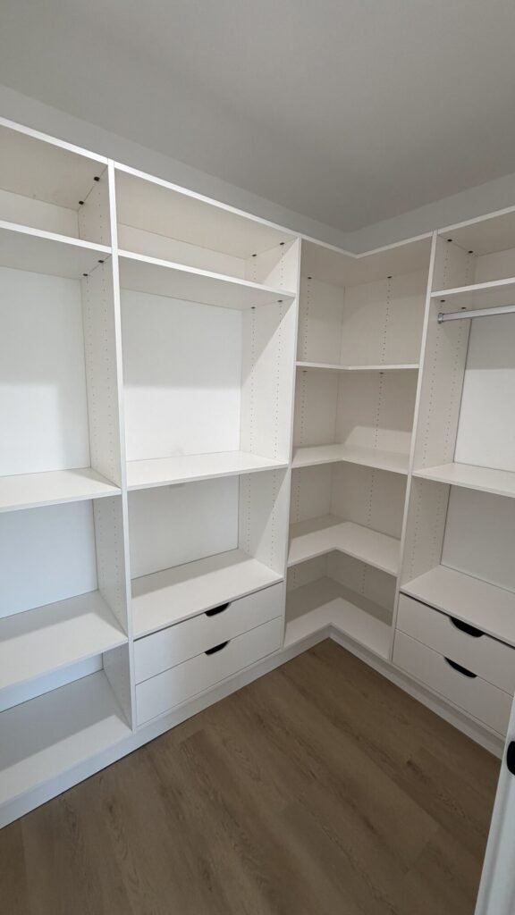 Custom closet built-ins with shelving and drawers - Rafa Home Builders