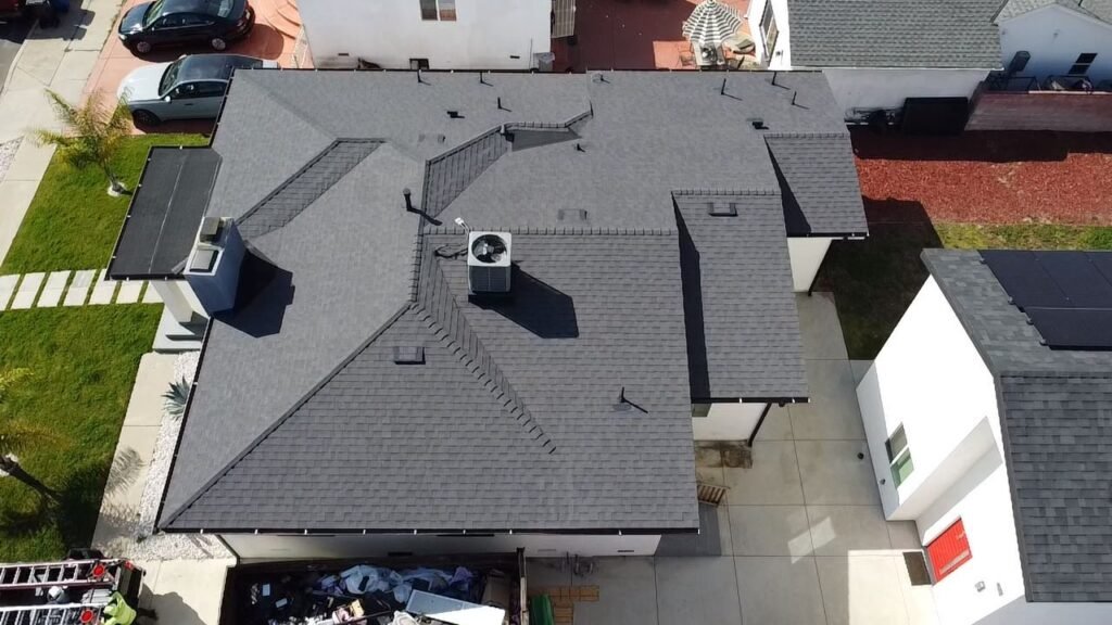 Aerial view of a completed asphalt shingle roof - Rafa Home Builders